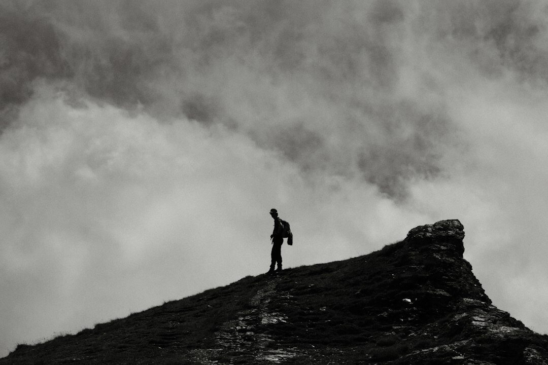 person hiking in swiss alps